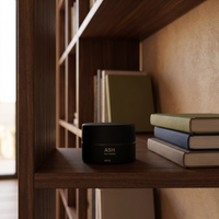 Carbon ASH ma'moul jar on a walnut bookshelf