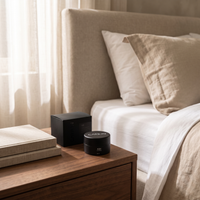 Carbon ASH ma'moul box and jar on a bedside table