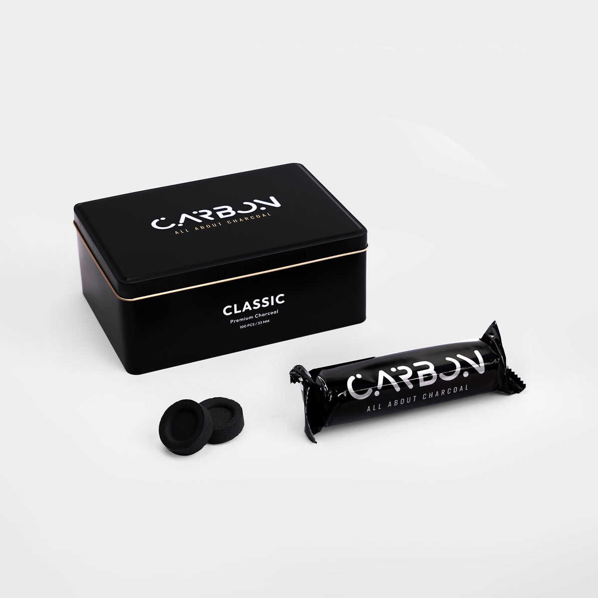Carbon Classic 33mm charcoal tin with a roll and two pieces