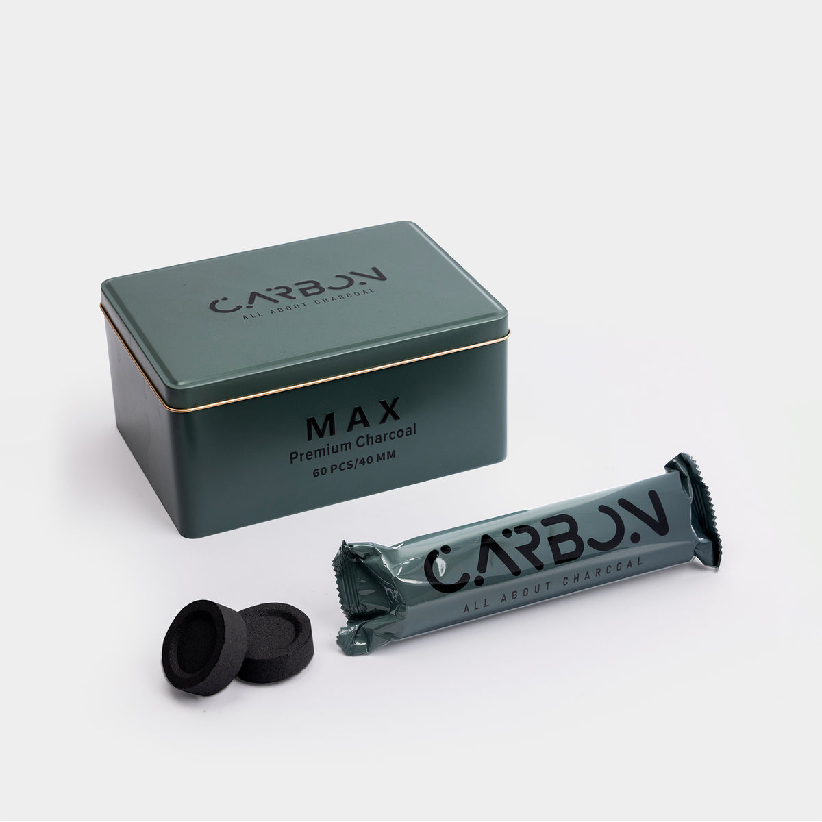 Carbon Max 40mm green tin with a roll and charcoal pieces