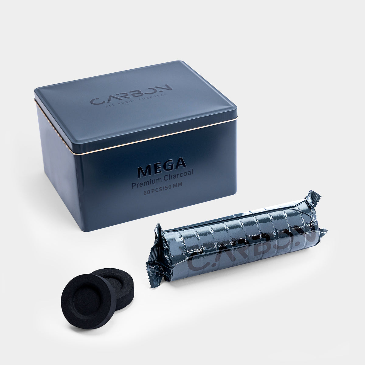Carbon Mega 50mm navy tin with a roll and charcoal pieces